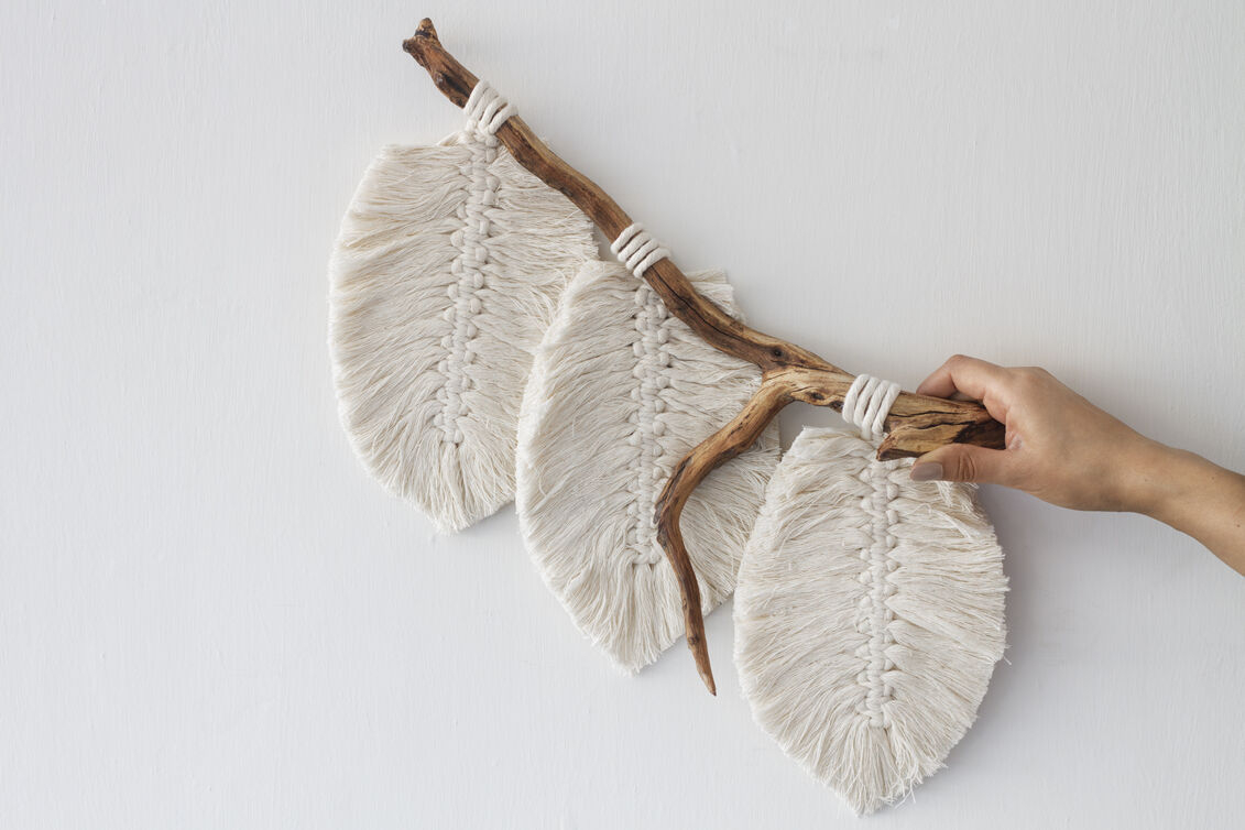 Bohemian wall art made from yarn and sticks
